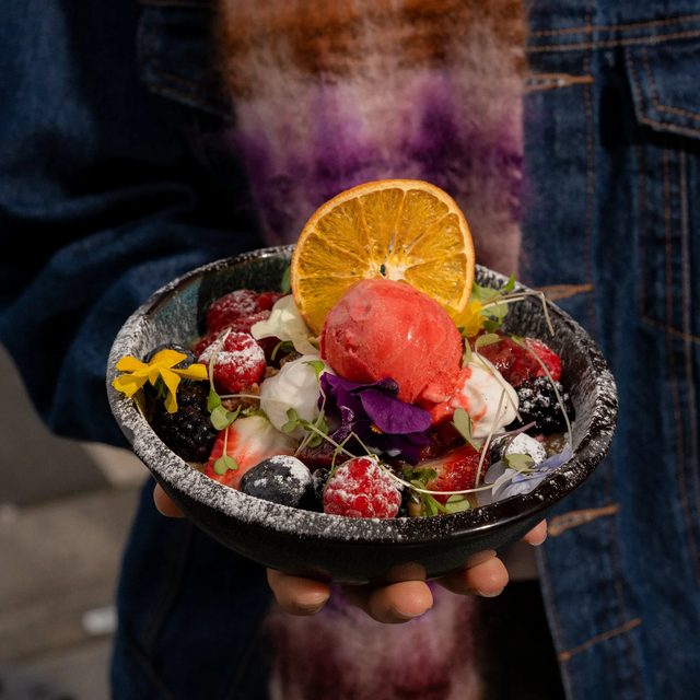Acai bowl with granola and seasonal fruit